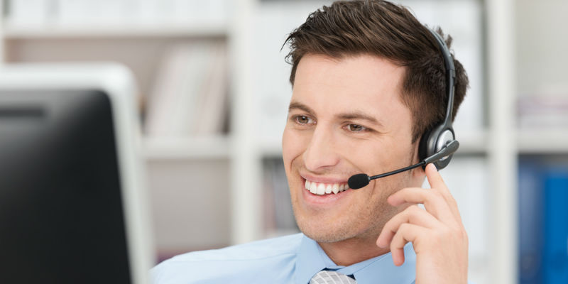 A customer service agent on the phone