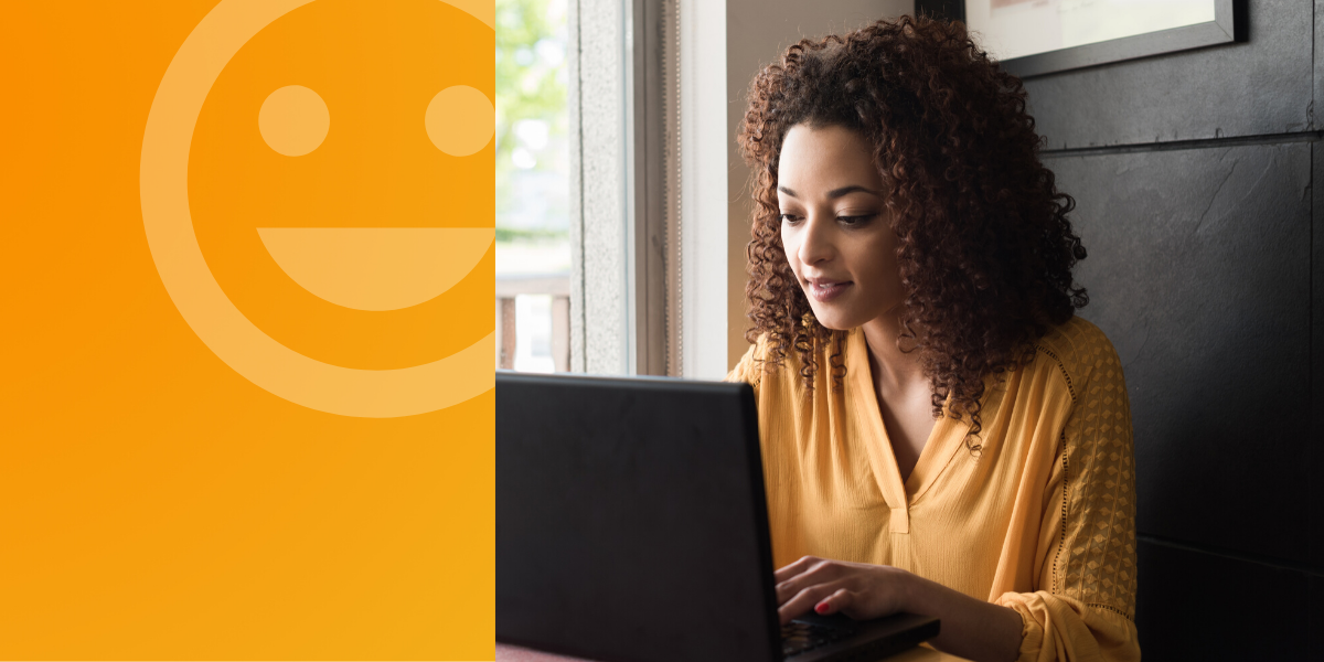 Happy woman on laptop